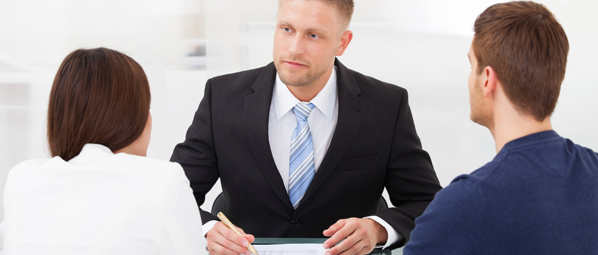 image of an attorney meeting with a couple